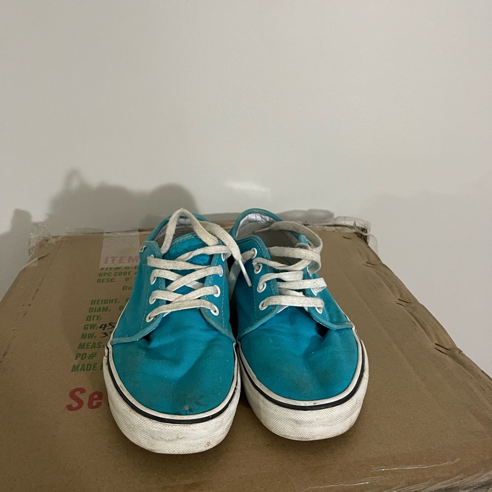 I’m selling some light blue low top vans size 10